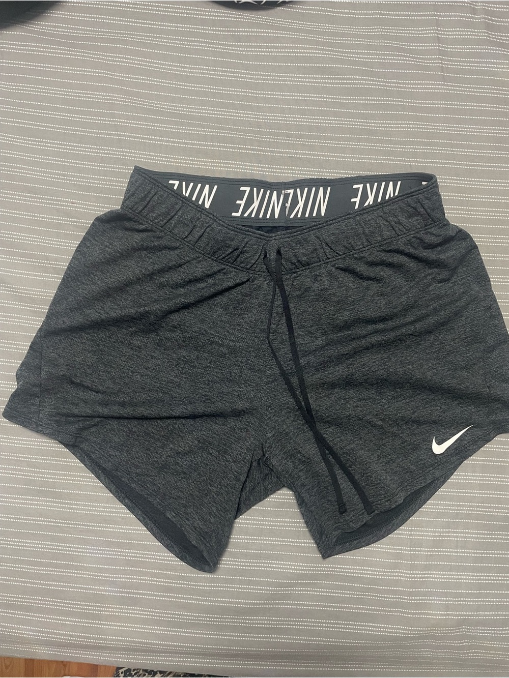 Nike Women's Charcoal Gray Athletic Shorts with White Swoosh
